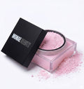 Monae Beauty Blur & Bake Loose Setting Powder in Pink Sugar, a soft pink loose setting powder that brightens the under-eye area and helps reduce the appearance of dullness.